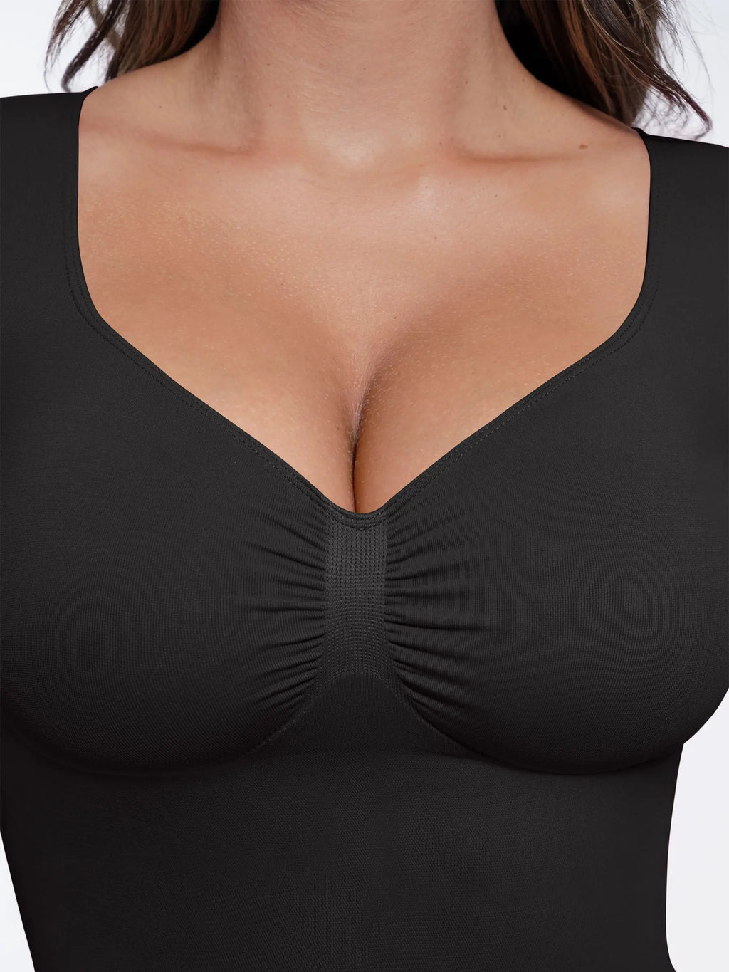 Body tipo tanga de manga larga y sin costuras con control de abdomen