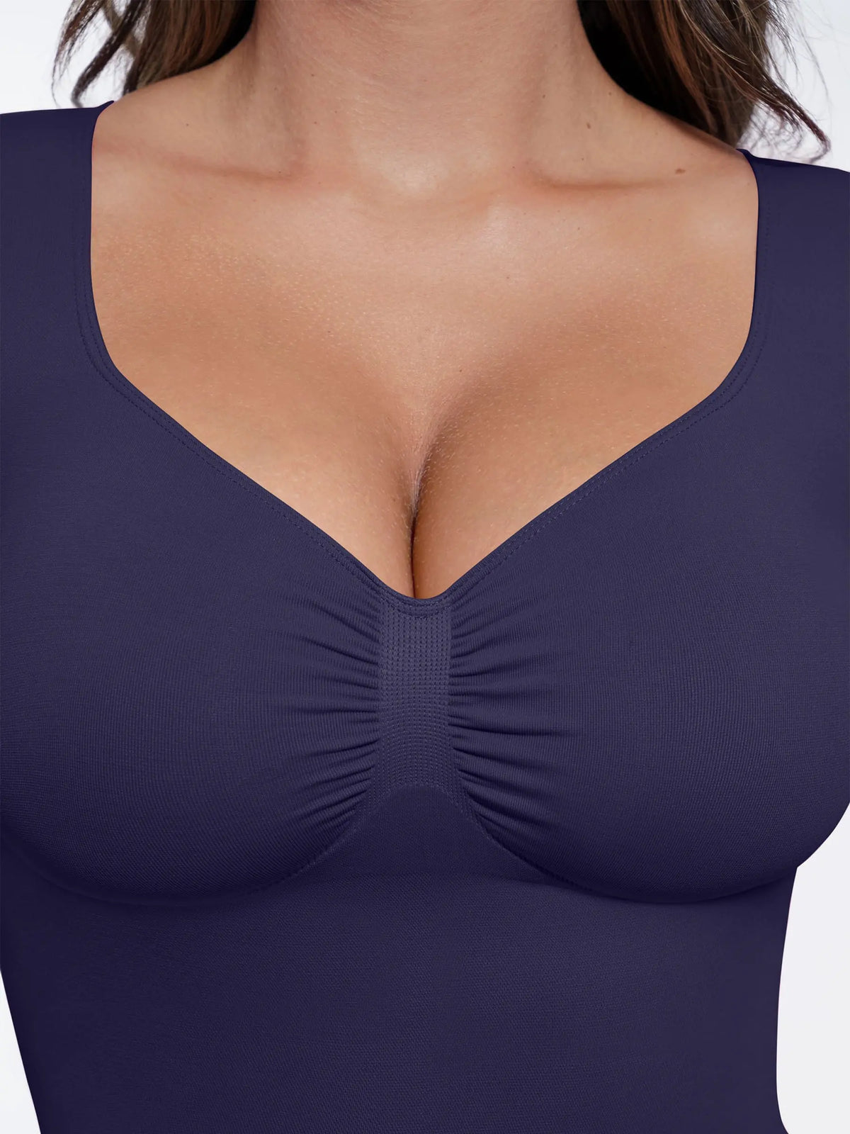 Body tipo tanga de manga larga y sin costuras con control de abdomen