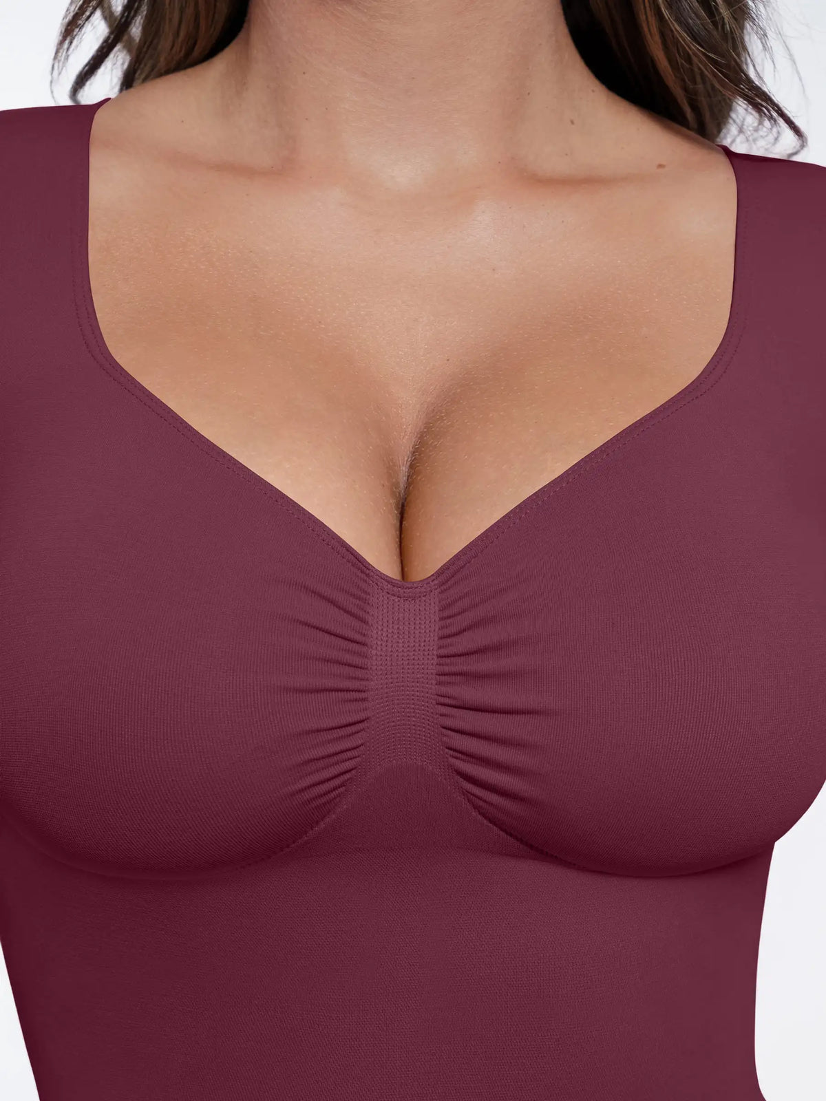Body tipo tanga de manga larga y sin costuras con control de abdomen