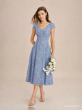 Vestido midi azul , botones y estampado floral